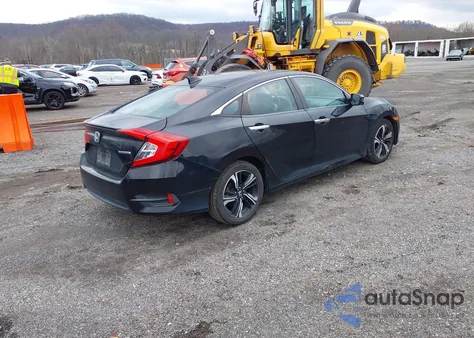 2017 Honda Civic Touring из США, поврежденный, VIN 2HGFC1F99HH653044
